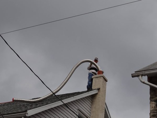Installing a chimney liner